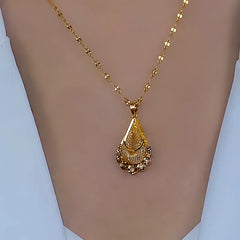 Close-up of the pendant and clasp on the Golden Mesh Drop