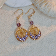 Model showcasing the dangle and style of the 14K Gold-Plated Zircon Mesh Water Drop Ear Hook Earrings