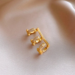 Angled view of the 14K Gold-Plated Zircon Multi-Layer Ear Clip Earrings ( 1 Pair )