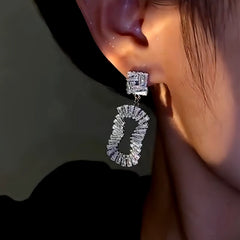Close-up detail of the sparkling zircons and plating on the Silver Oval Drops
