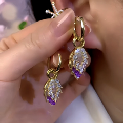 Close-up detail of the sparkling zircons and plating on the Leaf Tassel Earrings