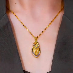 Close-up of the pendant and clasp on the Water Drop Necklace