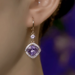 Close-up detail of the sparkling zircons and plating on the Tassel Earrings