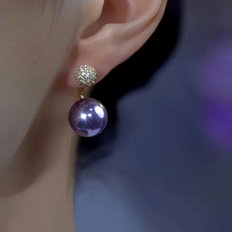 Close-up detail of the sparkling zircons and plating on the Jacket Earrings