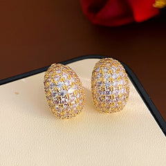 Angled view of the 14K Gold-Plated Zircon Small C-Shaped Earrings