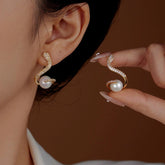 Women's Gold Pave CZ Snake Pearl Stud Earrings - One Worn, One Held In Hand