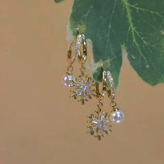 Close-up detail of the sparkling zircons and plating on the Pearl Tassel Earrings