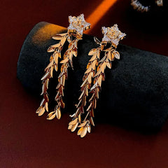 Model showcasing the dangle and style of the 14K Gold-Plated Zircon Star Wheat Tassel Earrings