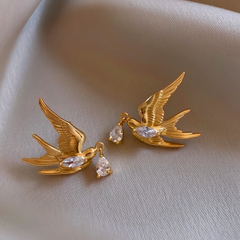 Angled view of the 14K Gold-Plated Zircon Swallow Water Drop Earrings