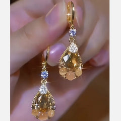 Close-up detail of the sparkling zircons and plating on the Tear Drop Earrings