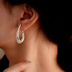 Model showcasing the dangle and style of the 14K Gold-Plated Zircon Water Drop Ear Hooks
