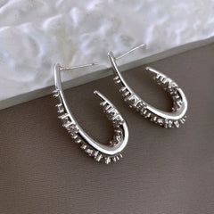 Angled view of the 14K Gold-Plated Zircon Water Drop Ear Hooks
