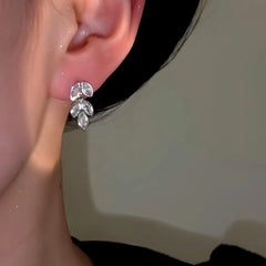 Angled view of the 14K Gold-Plated Zircon Wheat Tassel Earrings