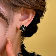 Close-up detail of the sparkling zircons and plating on the Black Flower Earrings