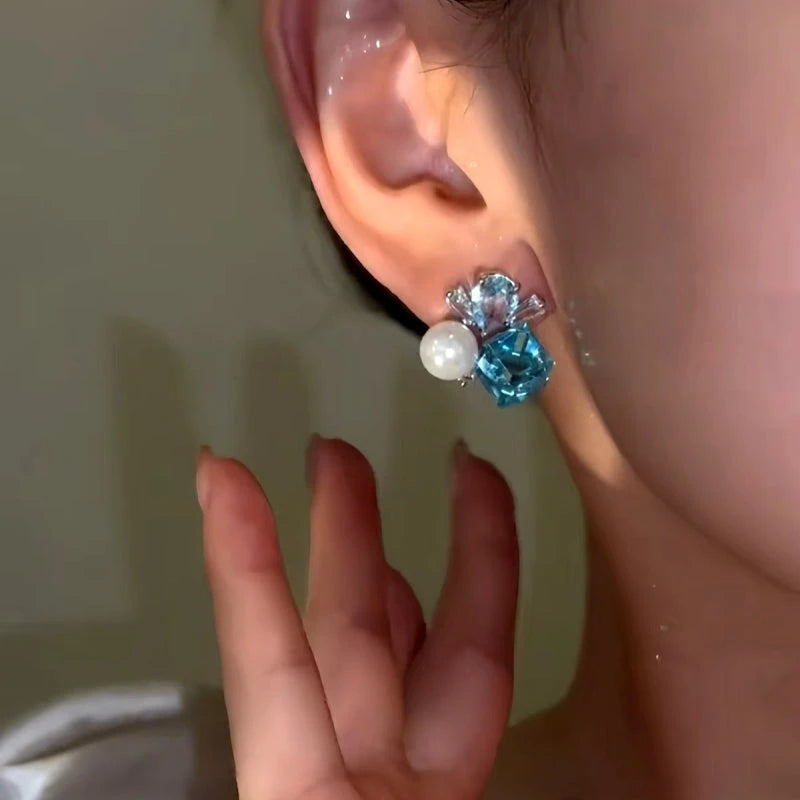 Close-up detail of the sparkling zircons and plating on the Blue Diamond Earrings