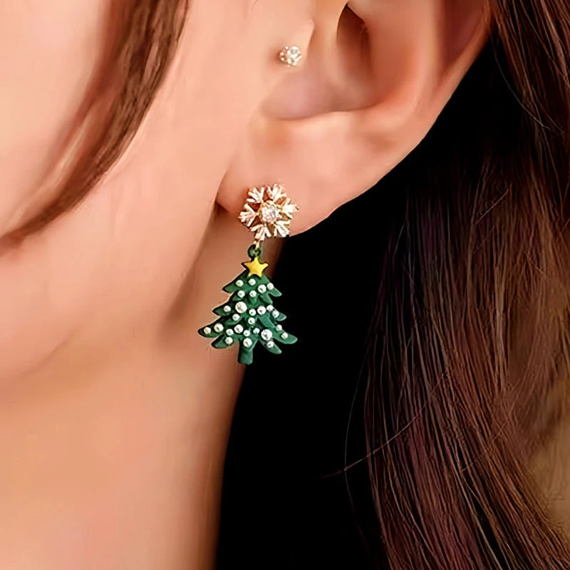 Model showcasing the dangle and style of the 14K Gold-plated Christmas Diamond Zircon Snowflake Christmas Tree Earrings
