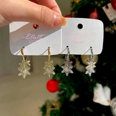 Close-up detail of the sparkling zircons and plating on the Zircon Snowflake Earrings