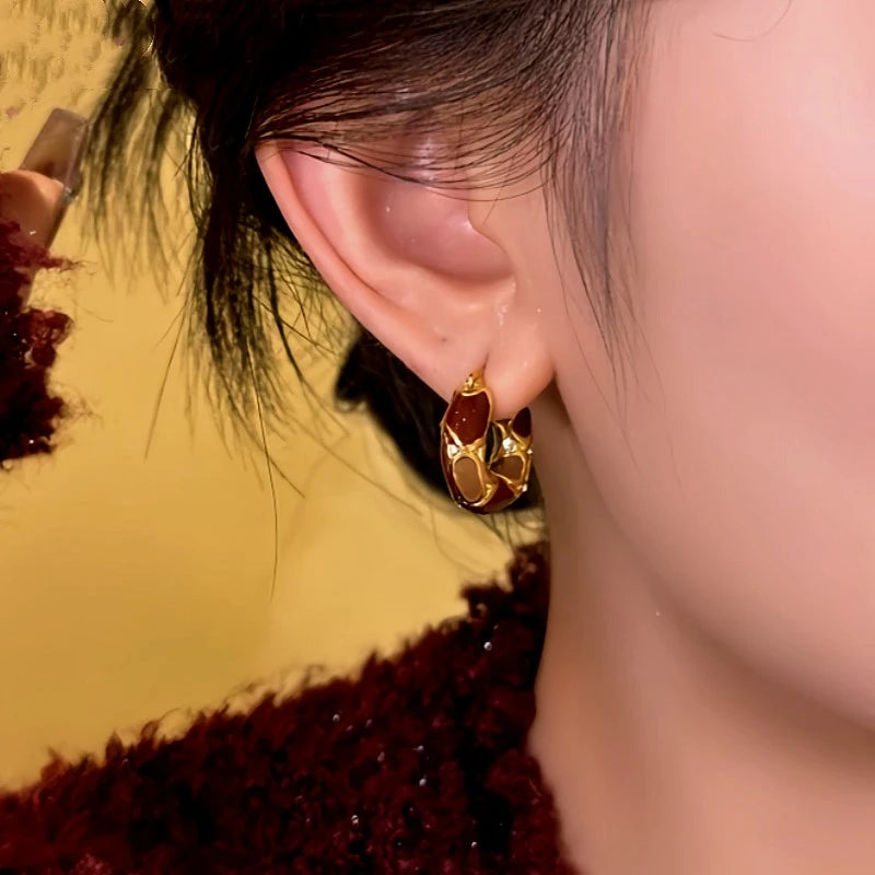 Close-up detail of the sparkling zircons and plating on the Color Matching Hoops