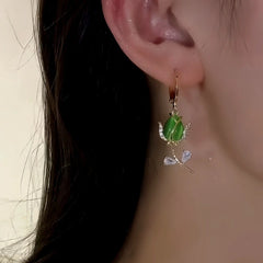 Close-up detail of the sparkling zircons and plating on the Green Tulip Earrings