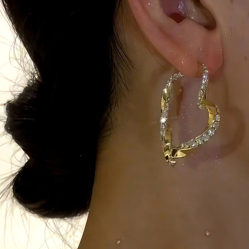 Close-up detail of the sparkling zircons and plating on the Diamond Heart Earrings