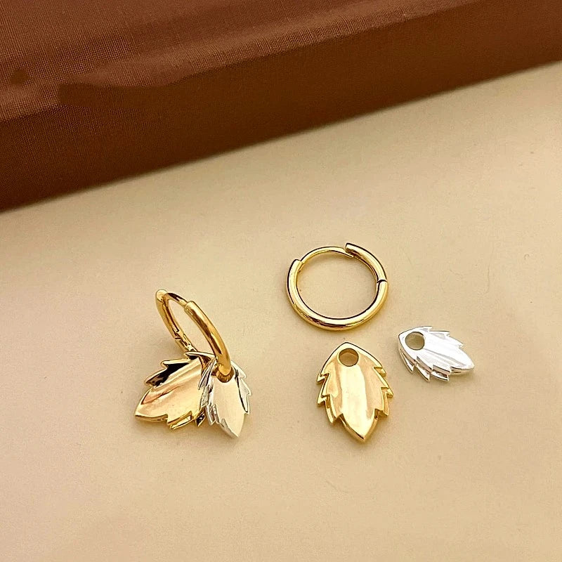 Close-up detail of the sparkling zircons and plating on the Double Leaf Earrings