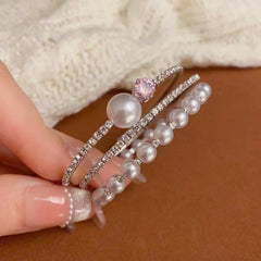 Full view of the elegant 14K Gold-plated Exquisite Zircon Pearl Stacking Bracelets