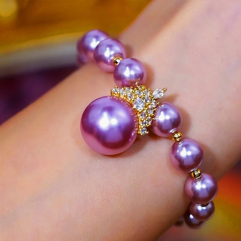 Close-up of the clasp and charm details on the Purple Pearl Bracelet