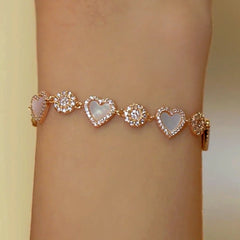 Close-up of the clasp and charm details on the Sun Heart Bracelet