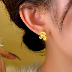 Close-up detail of the sparkling zircons and plating on the Zircon Flower Studs