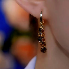 Close-up detail of the sparkling zircons and plating on the Brown Diamond Earrings