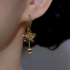 Close-up detail of the sparkling zircons and plating on the Diamond Flower Earrings