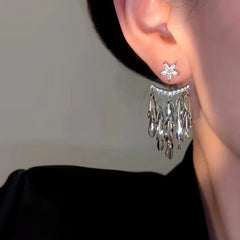 Model showcasing the dangle and style of the 14K Gold-plated Luxury Simple Tassel Earrings