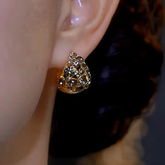 Close-up detail of the sparkling zircons and plating on the Luxury Zircon Earrings