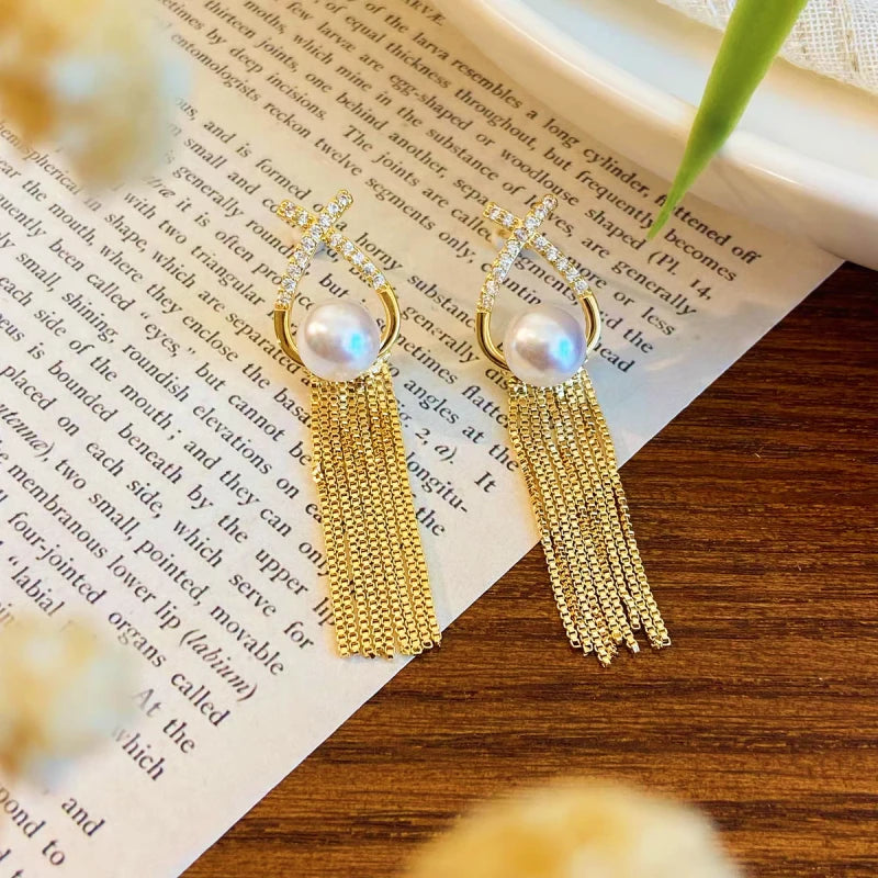 Close-up detail of the sparkling zircons and plating on the Pearl Tassel Earrings