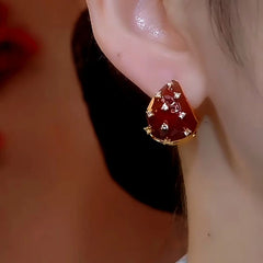 Close-up detail of the sparkling zircons and plating on the Strawberry Earrings