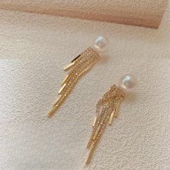 Close-up detail of the sparkling zircons and plating on the Pearl Tassel Earrings