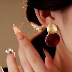 Angled view of the 14K Gold Plated Oil Drop Earrings