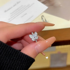 Angled view of the 14K Gold Plated Zircon Butterfly Hoop Earrings