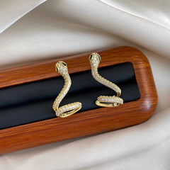 Angled view of the 14K Gold Plated Zodiac Snake Year Snake-Shaped Ear Bone Clip Earrings