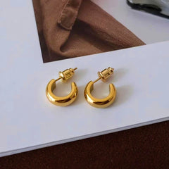 Angled view of the 18K Gold-Plated C-Shaped Earrings