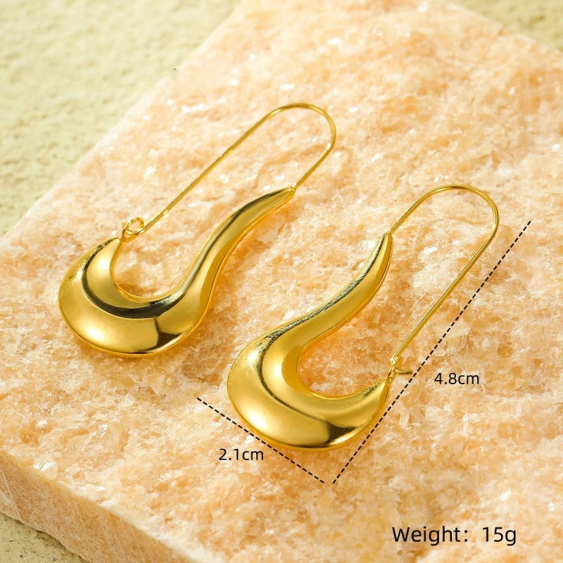 Angled view of the 18K Gold-Plated Curved Water Drop Earrings