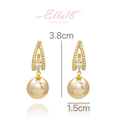 Angled view of the 18K Gold-Plated Diamond Pearl Drop Earrings