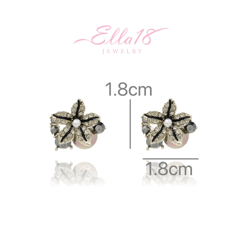 Angled view of the 18K Gold-Plated Diamond Stafish Stud Earrings