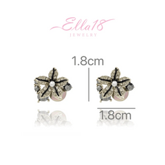 Angled view of the 18K Gold-Plated Diamond Stafish Stud Earrings