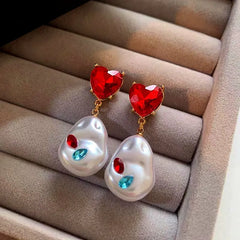 Close-up detail of the sparkling zircons and plating on the Pearl Earrings