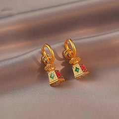 Close-up detail of the sparkling zircons and plating on the Bell-Shaped Earrings