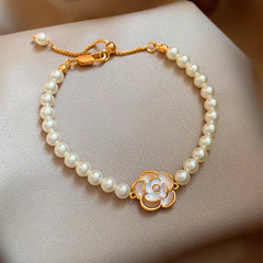 Full view of the elegant 18K Gold-Plated Exquisite Pearl Camellia Bracelet