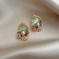 Close-up detail of the sparkling zircons and plating on the Pearl Stud Earrings