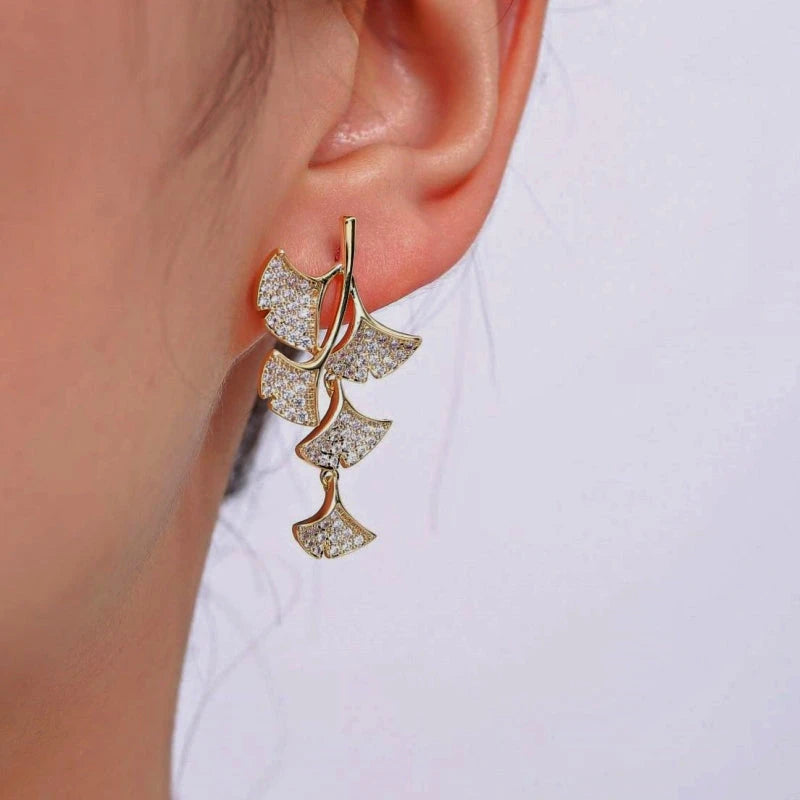 Close-up detail of the sparkling zircons and plating on the Ginkgo Leaf Earrings