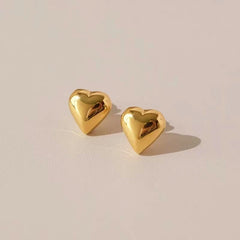 Angled view of the 18K Gold-Plated Heart Stud Earrings